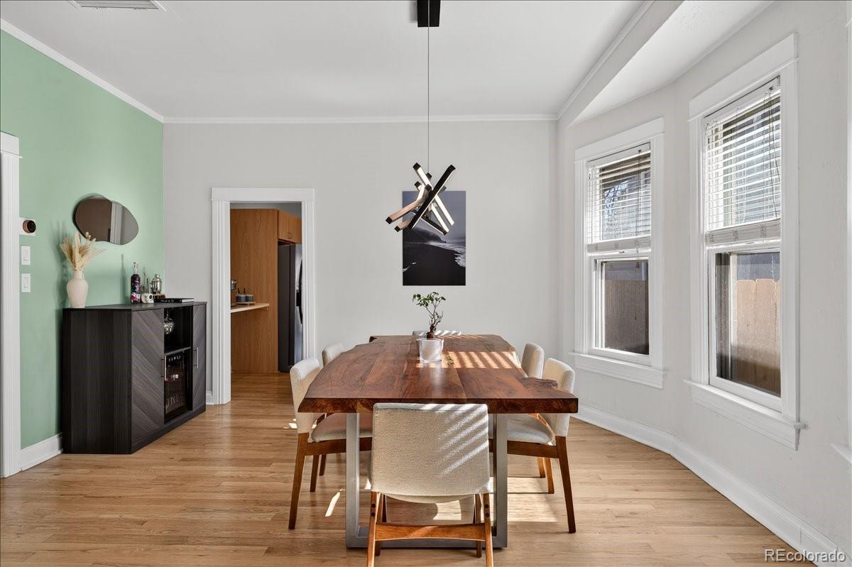 854 South Clarkson Street Denver, CO 80209 - Photo 12 of 50 a dining room with furniture and window