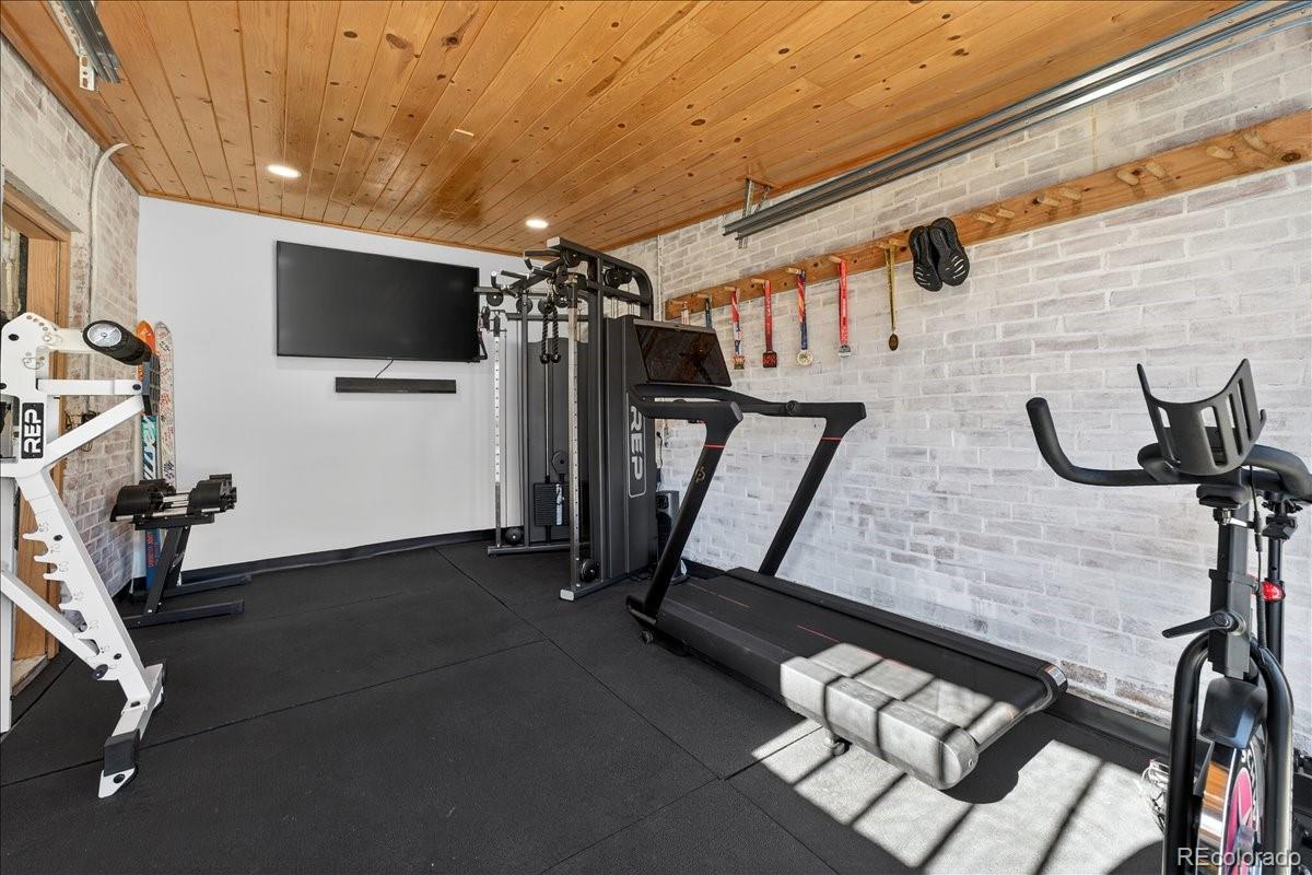 854 South Clarkson Street Denver, CO 80209 - Photo 26 of 50 a view of a room with gym equipment