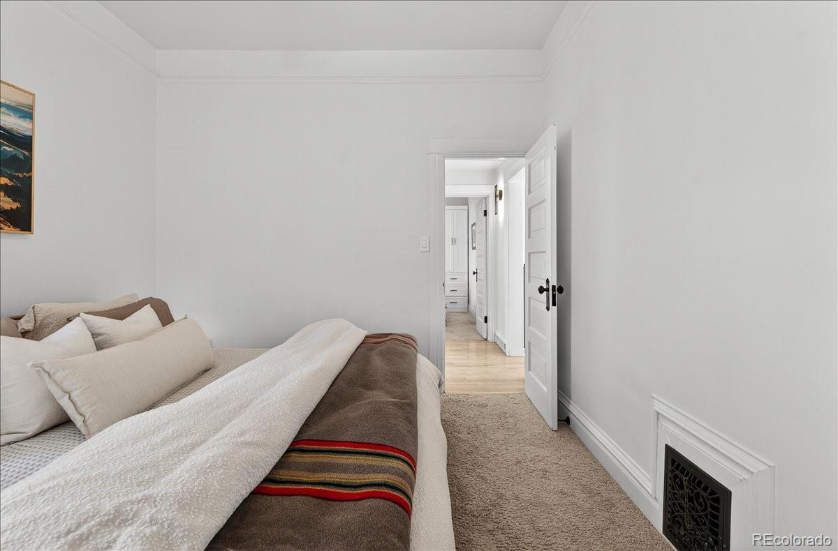 854 South Clarkson Street Denver, CO 80209 - Photo 32 of 50 a living room with furniture and a couch