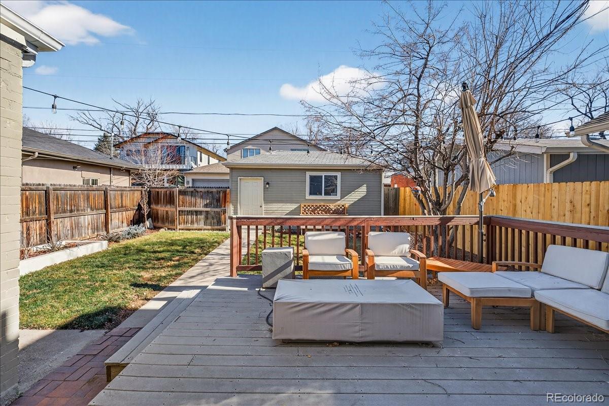 854 South Clarkson Street Denver, CO 80209 - Photo 42 of 50 a view of a chairs and table on the wooden floor