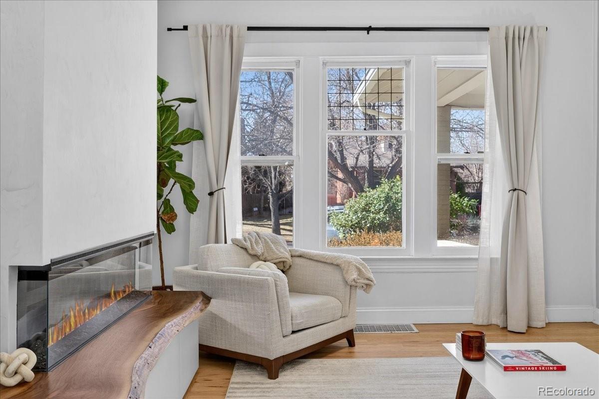 854 South Clarkson Street Denver, CO 80209 - Photo 8 of 50 a bedroom with furniture and a window