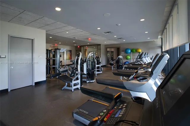 a view of a living room and dining room with furniture