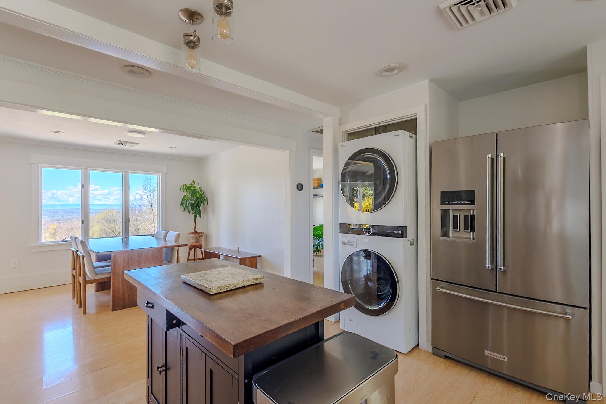 8 Horizon Road Cornwall, NY 12518 - Photo 14 of 35 a view of a kitchen with a dining table and chairs