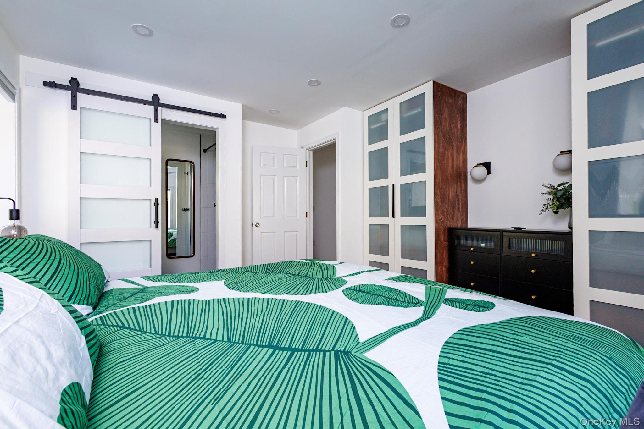 8 Horizon Road Cornwall, NY 12518 - Photo 26 of 35 a bedroom with a bed and a view of walk in closet