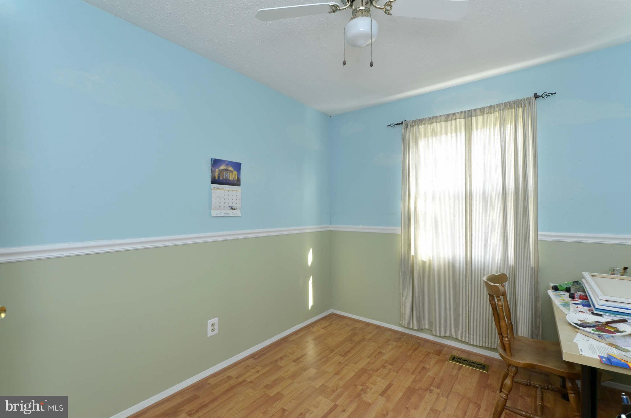 19 Pike Hall Place Baltimore, MD 21236 - Photo 21 of 30 a view of an empty room with a window