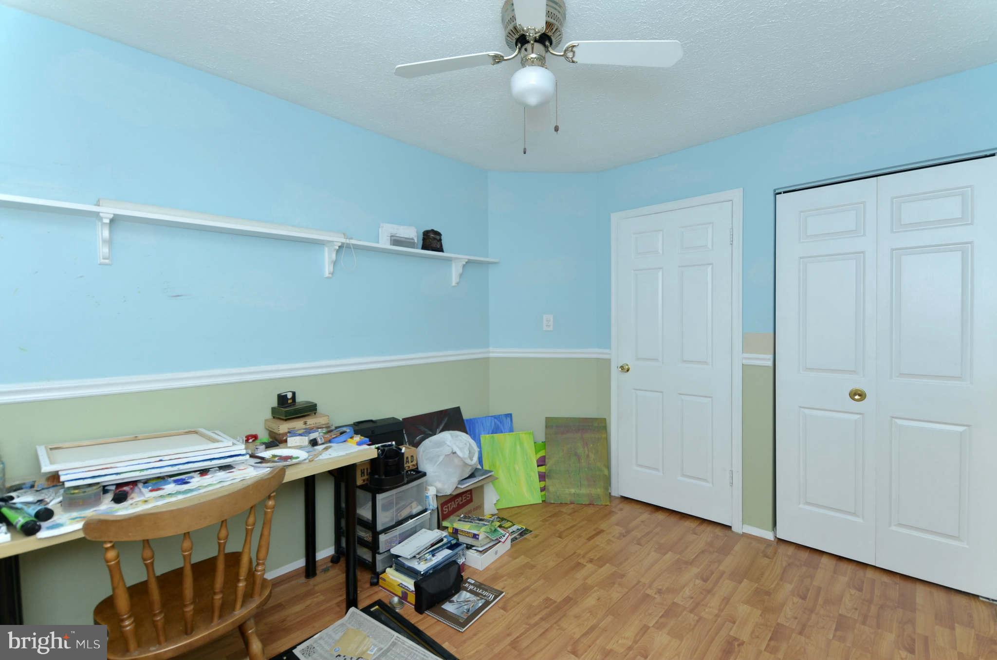 19 Pike Hall Place Baltimore, MD 21236 - Photo 23 of 30 a view of workspace with wooden floor