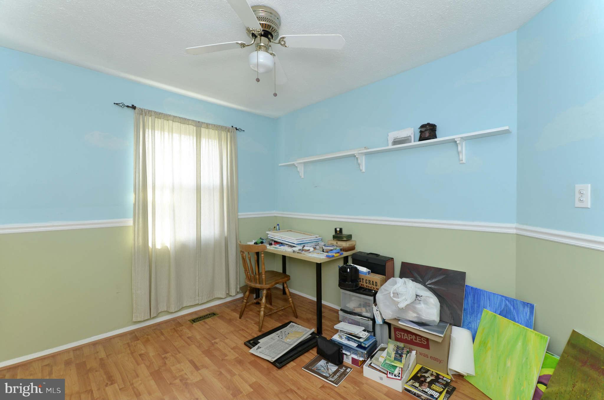 19 Pike Hall Place Baltimore, MD 21236 - Photo 24 of 30 a workspace with furniture and window