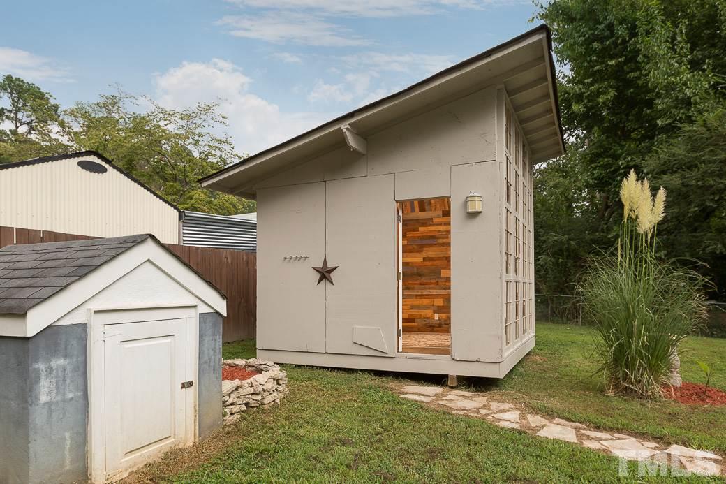 801 Sunny Lane Raleigh, NC 27603 - Photo 23 of 25 a view of outdoor space garage and yard