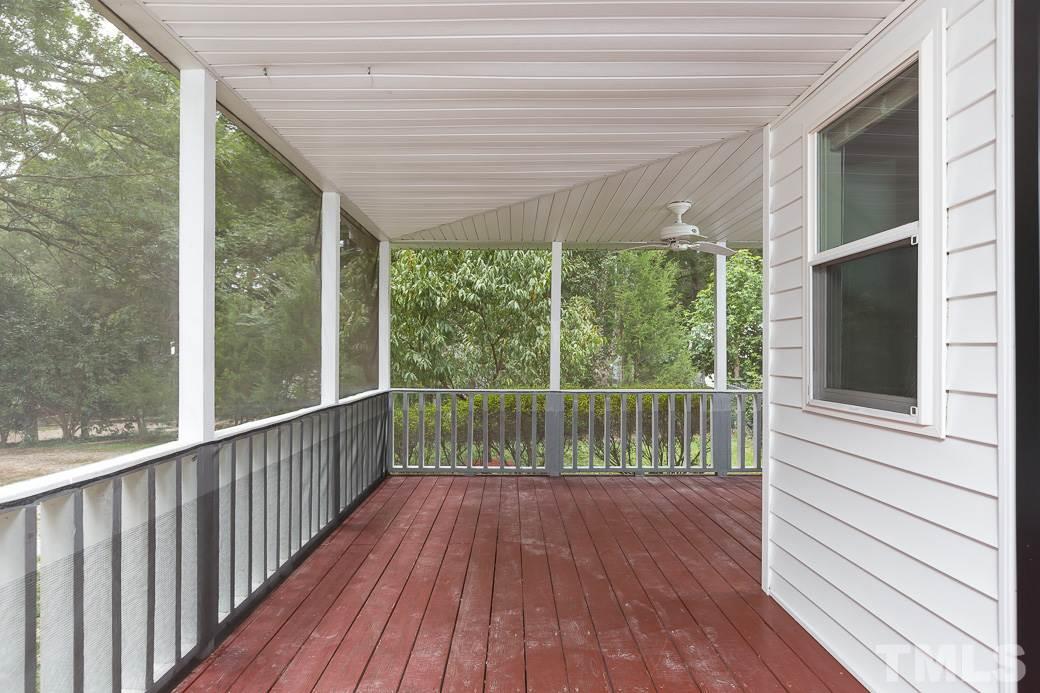 801 Sunny Lane Raleigh, NC 27603 - Photo 3 of 25 a view of a balcony with wooden floor