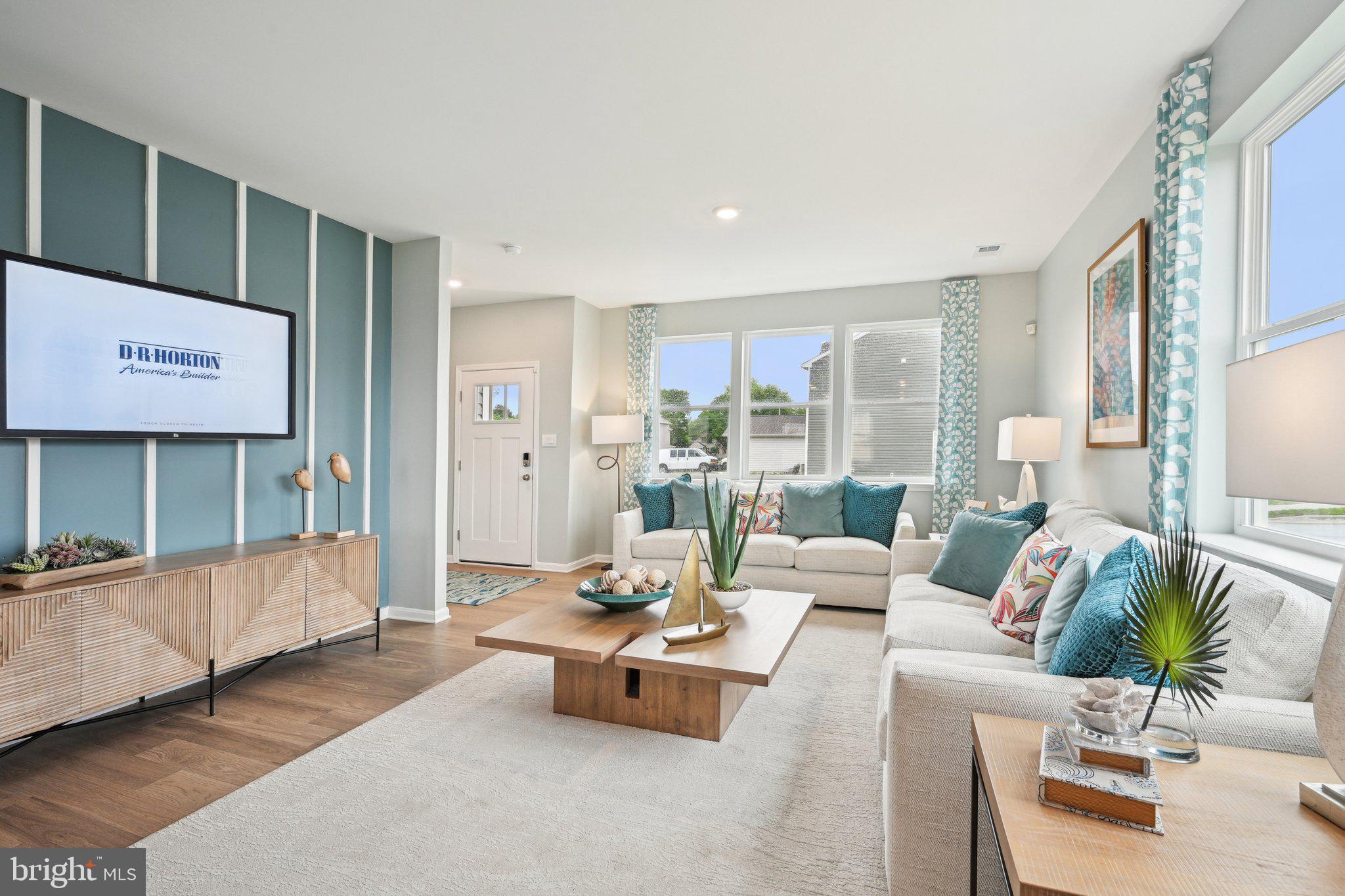 505 Colette Street Ellendale, DE 19941 - Photo 7 of 30 a living room with furniture and a table
