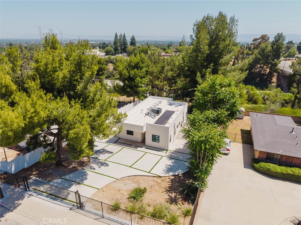 17846 Rinaldi Street Granada Hills, CA 91344 - Photo 31 of 34 an aerial view of a house with a yard basket ball court and outdoor seating