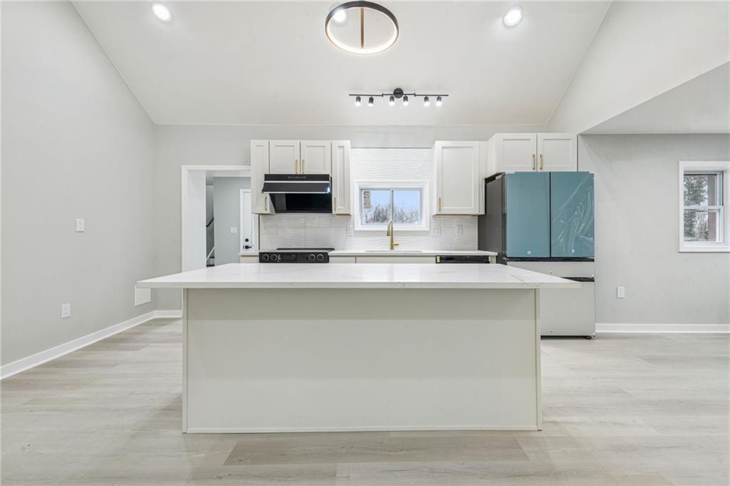 4531 Ridgeview Drive Greensburg, PA 15601 - Photo 12 of 41 a kitchen with kitchen island cabinets and stainless steel appliances