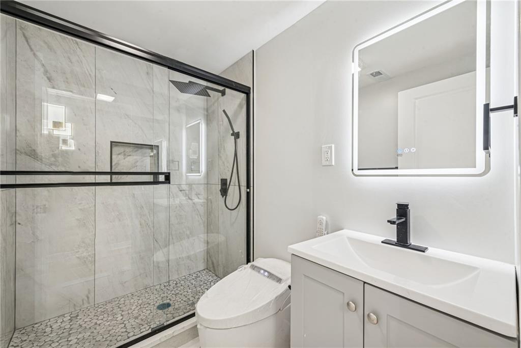 4531 Ridgeview Drive Greensburg, PA 15601 - Photo 18 of 41 a bathroom with a sink a toilet and shower