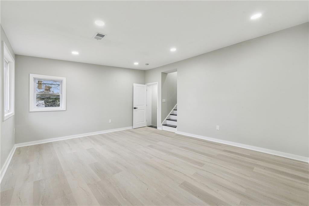 4531 Ridgeview Drive Greensburg, PA 15601 - Photo 20 of 41 an empty room with wooden floor and windows
