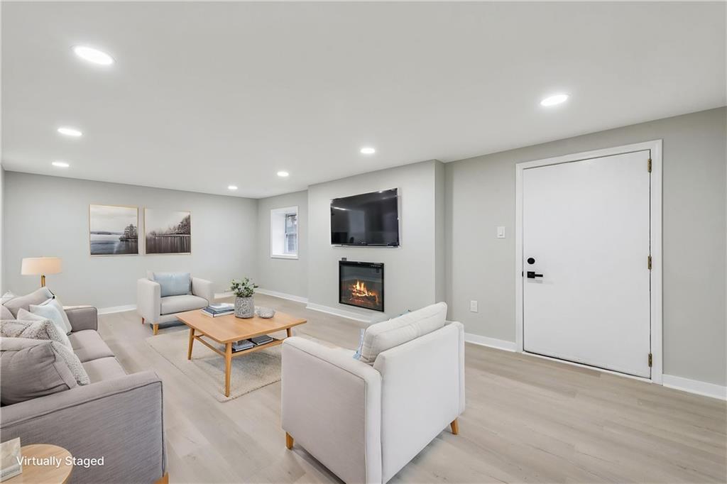 4531 Ridgeview Drive Greensburg, PA 15601 - Photo 27 of 41 a living room with furniture and a flat screen tv