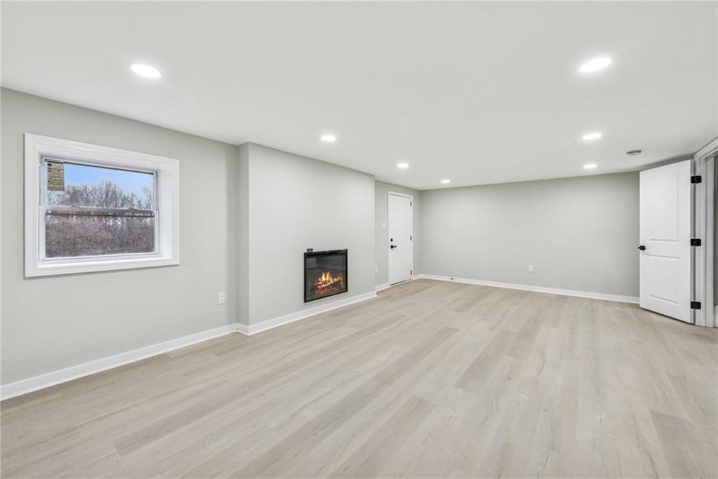 4531 Ridgeview Drive Greensburg, PA 15601 - Photo 28 of 41 a view of an empty room with a fireplace