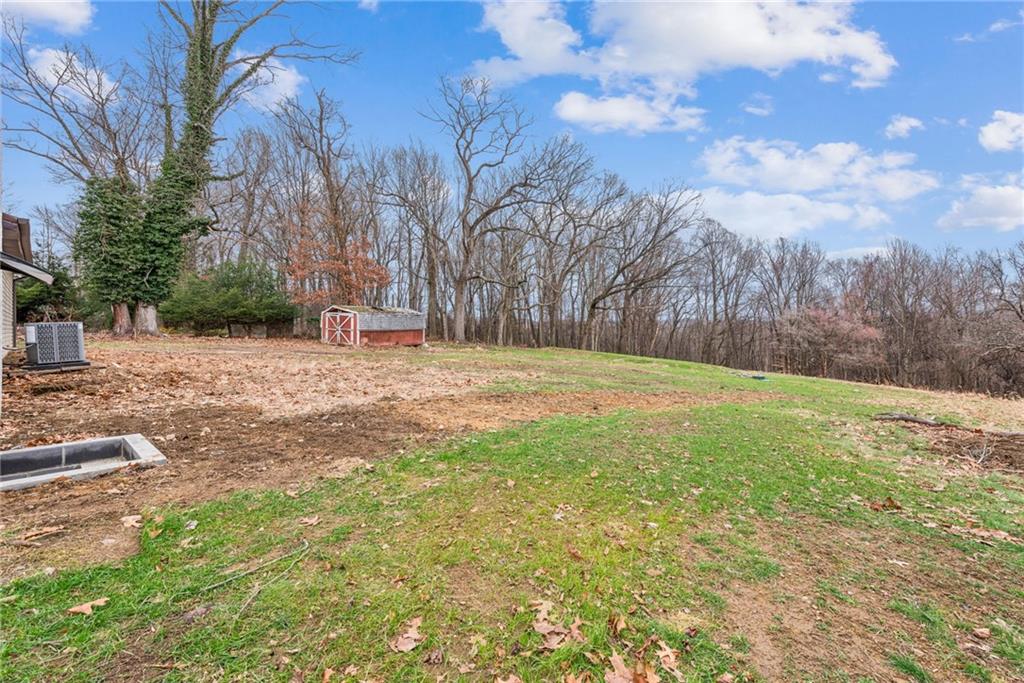 4531 Ridgeview Drive Greensburg, PA 15601 - Photo 31 of 41 a backyard of a house with lots of green space