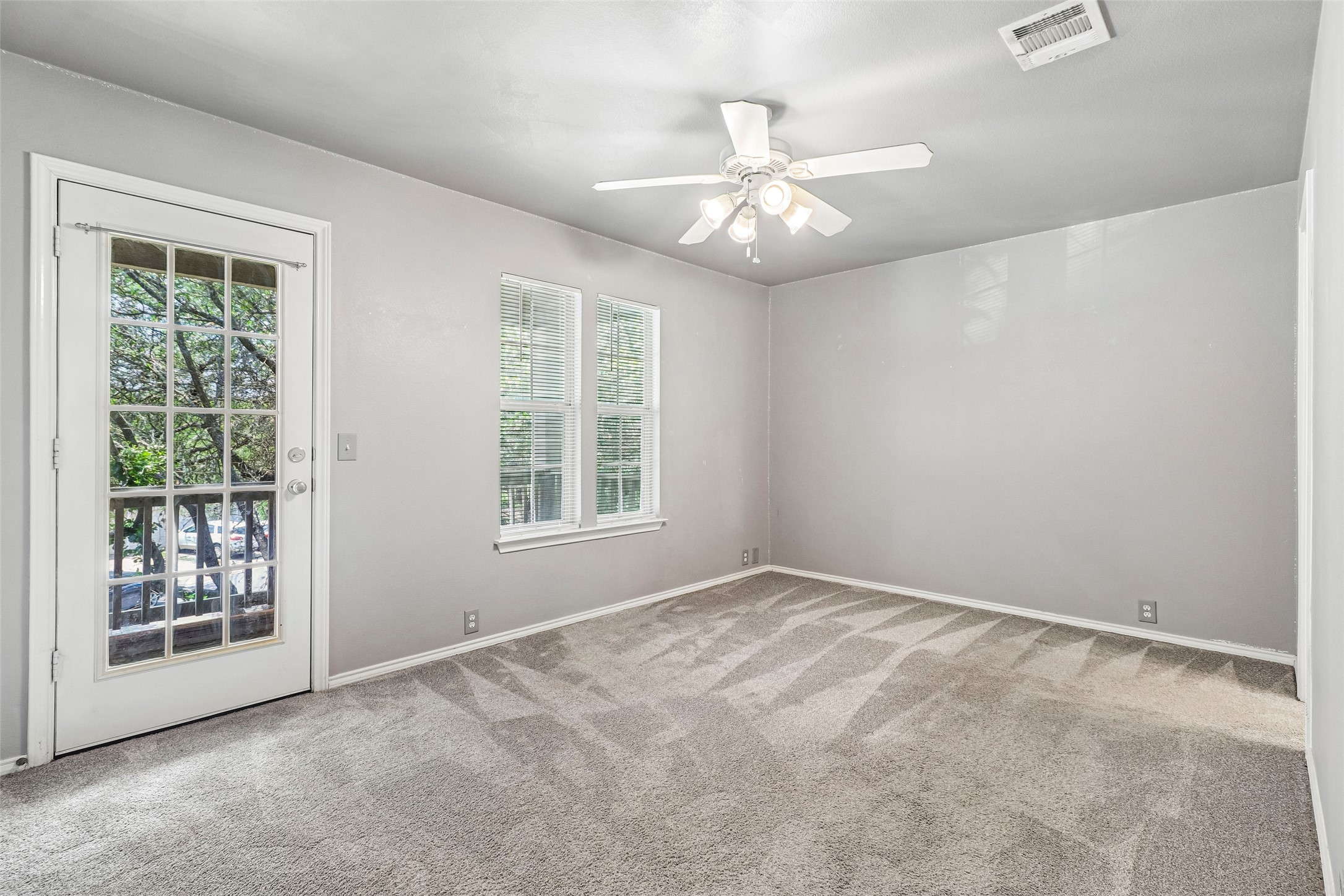 311 A Utterback Kyle, TX 78640 - Photo 21 of 40 a view of an empty room with a window
