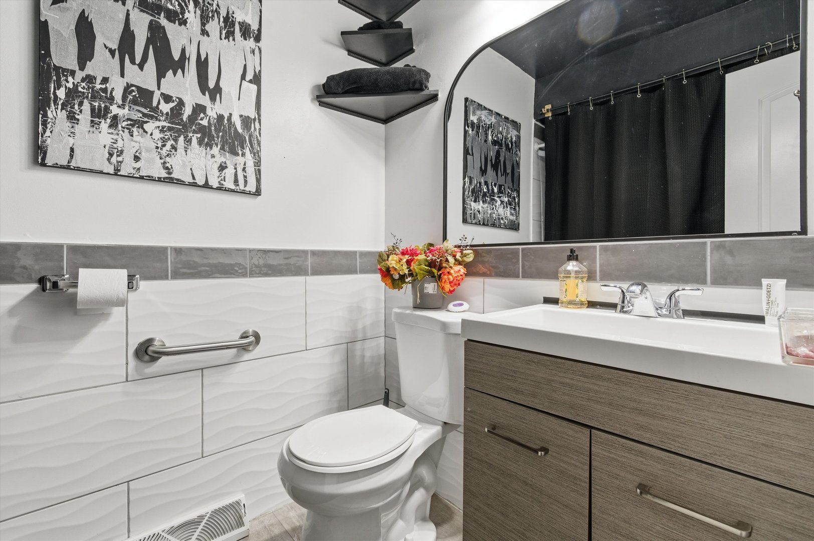 9904 South State Street, Unit B Chicago, IL 60628 - Photo 14 of 23 a bathroom with a sink and a mirror