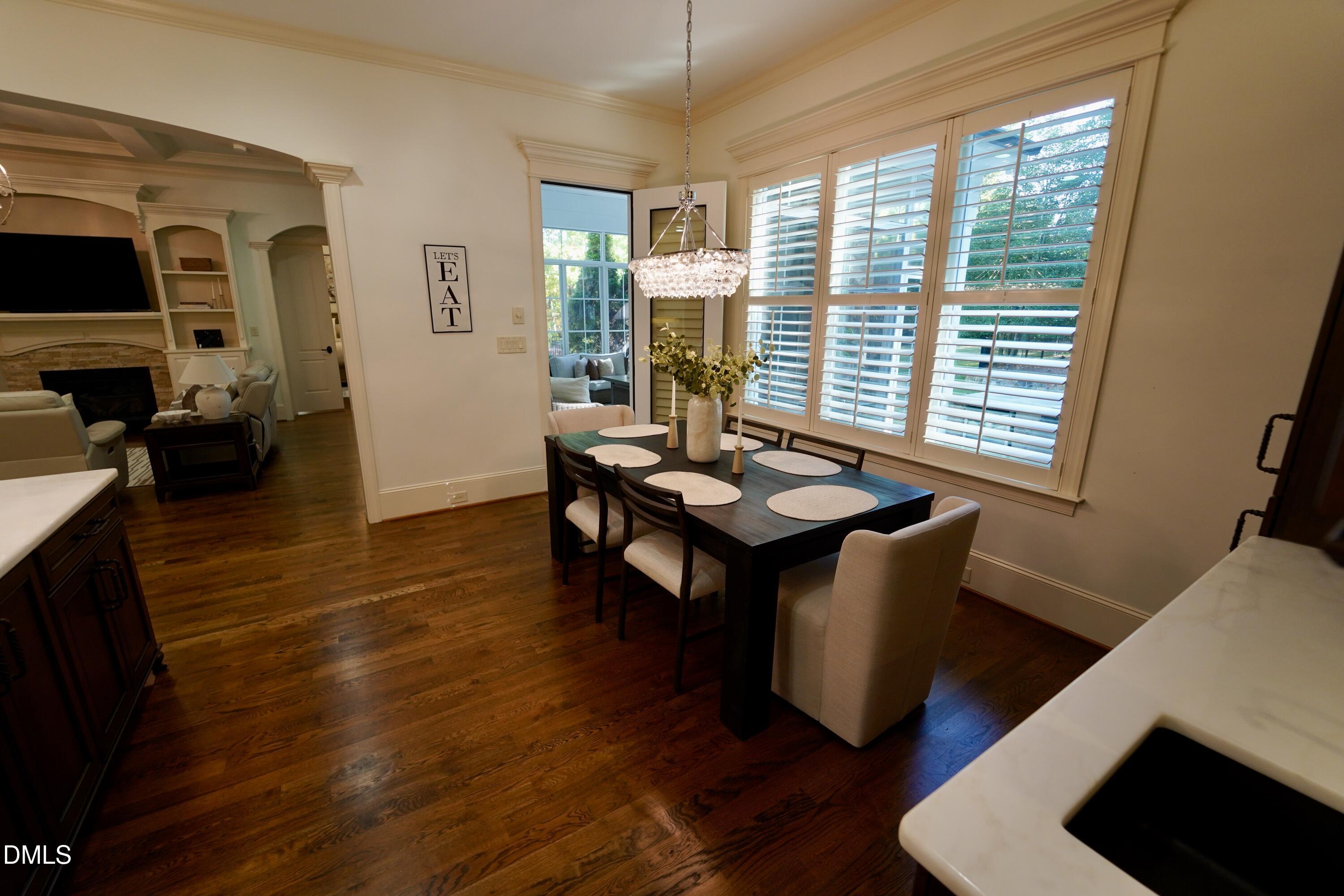2604 Homestead Forest Road Zebulon, NC 27597 - Photo 47 of 101 a living room with fireplace furniture and a flat screen tv