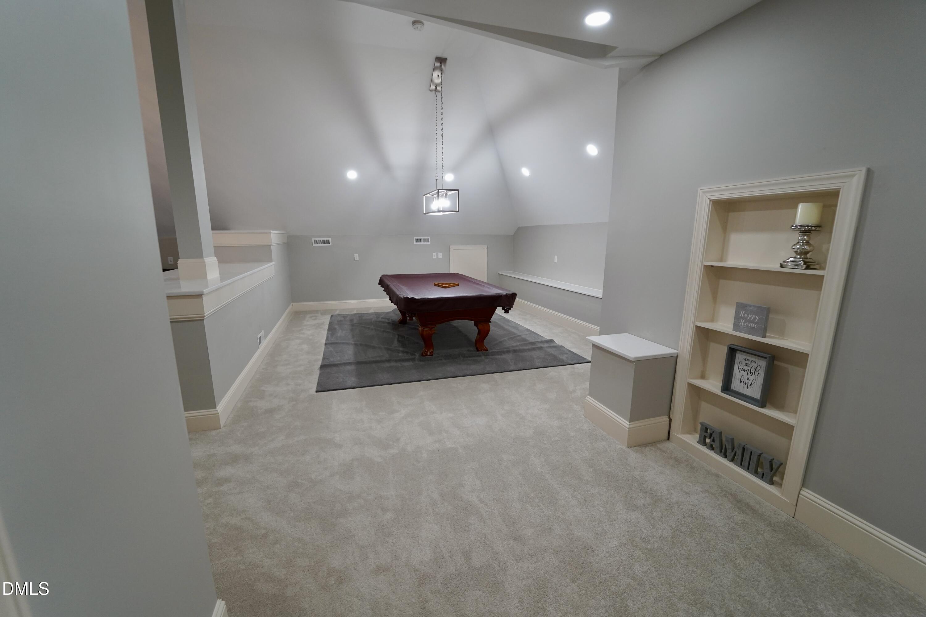 2604 Homestead Forest Road Zebulon, NC 27597 - Photo 57 of 101 a view of a room with shelves