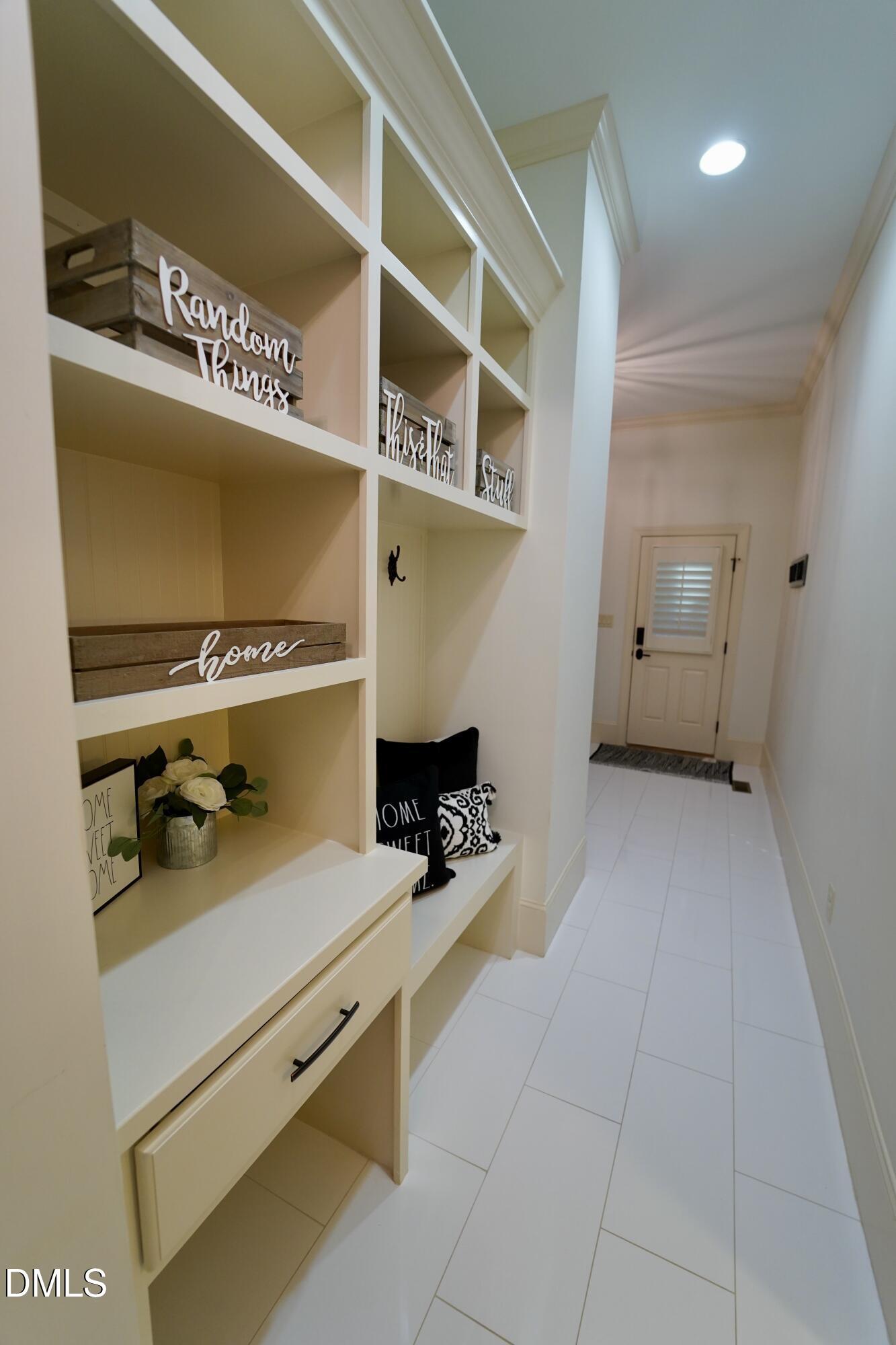 2604 Homestead Forest Road Zebulon, NC 27597 - Photo 72 of 101 a room with gym equipment and a view of living room