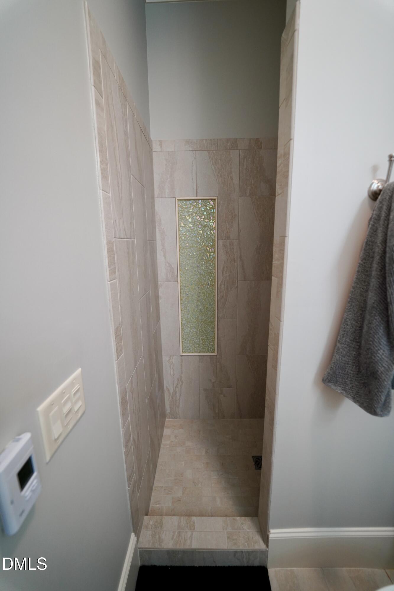 2604 Homestead Forest Road Zebulon, NC 27597 - Photo 76 of 101 a bathroom with a shower
