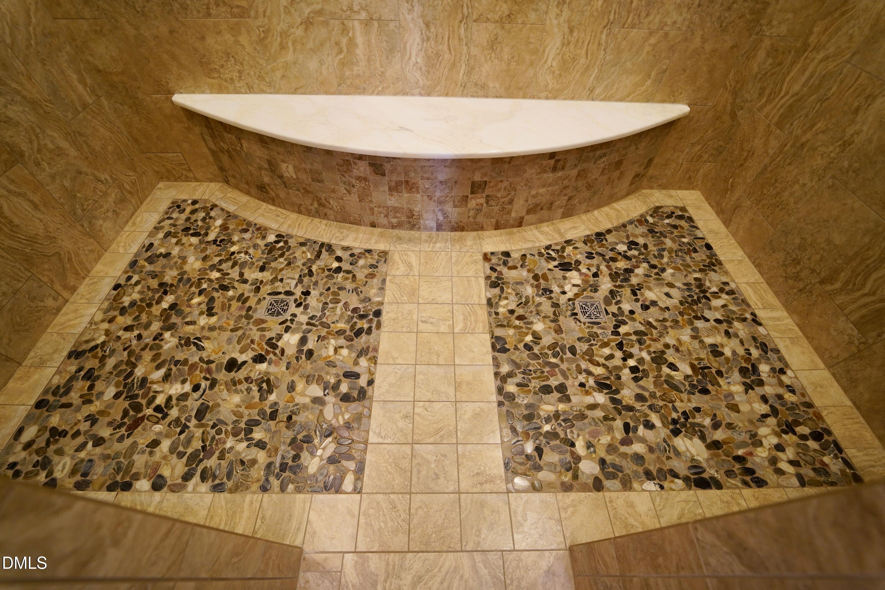 2604 Homestead Forest Road Zebulon, NC 27597 - Photo 96 of 101 a bathroom with a bathtub and shower