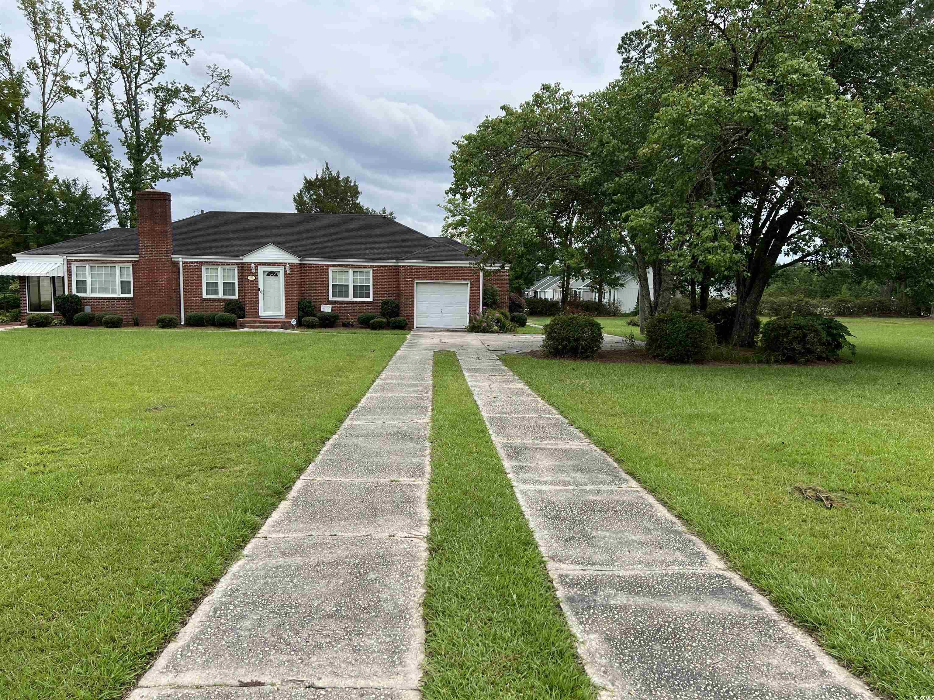 880 Horry Road Conway, SC 29526 - Photo 1 of 16 View of front facade featuring a garage and a fron