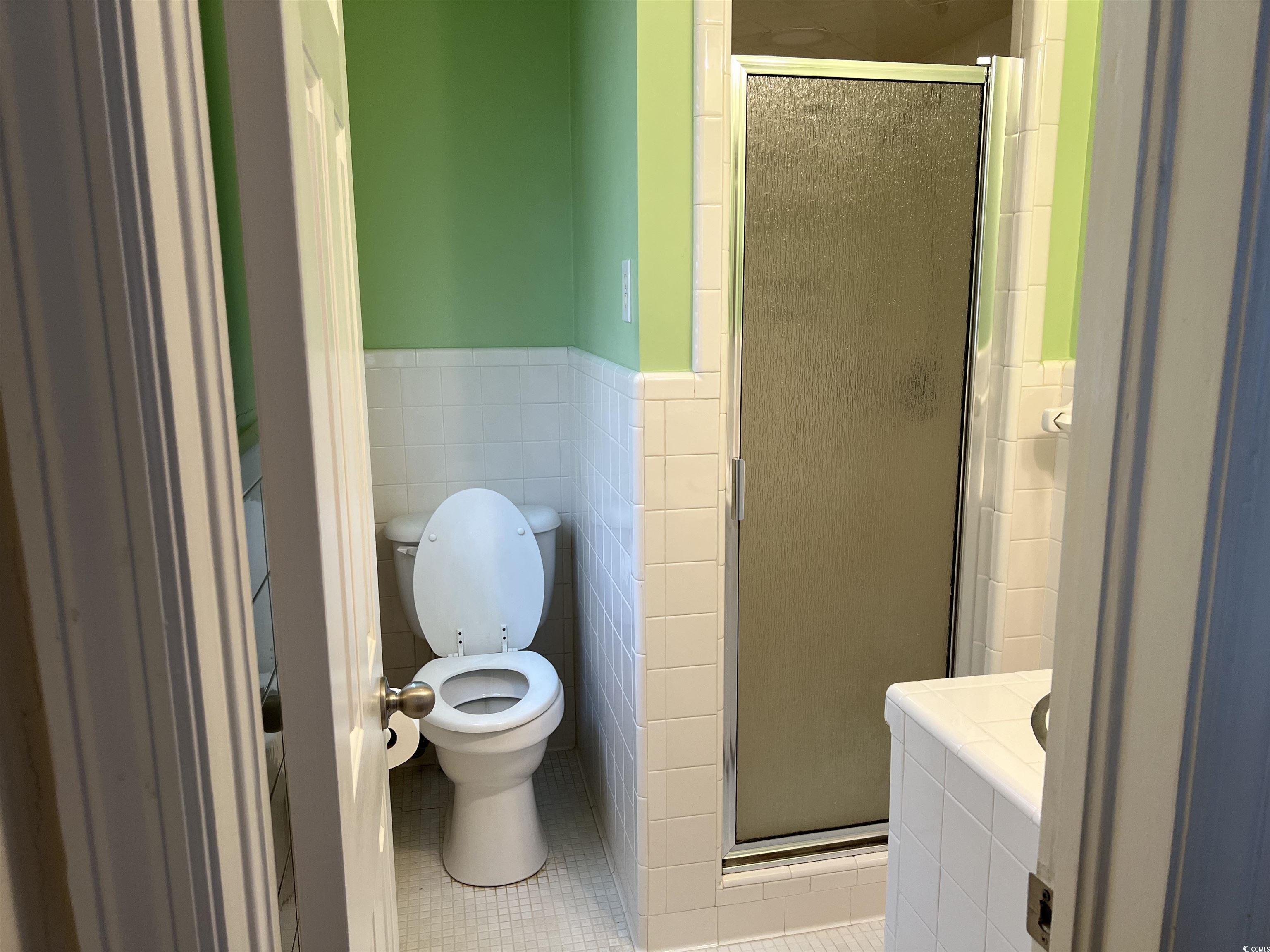 880 Horry Road Conway, SC 29526 - Photo 11 of 16 Bathroom featuring tile patterned flooring, tile w