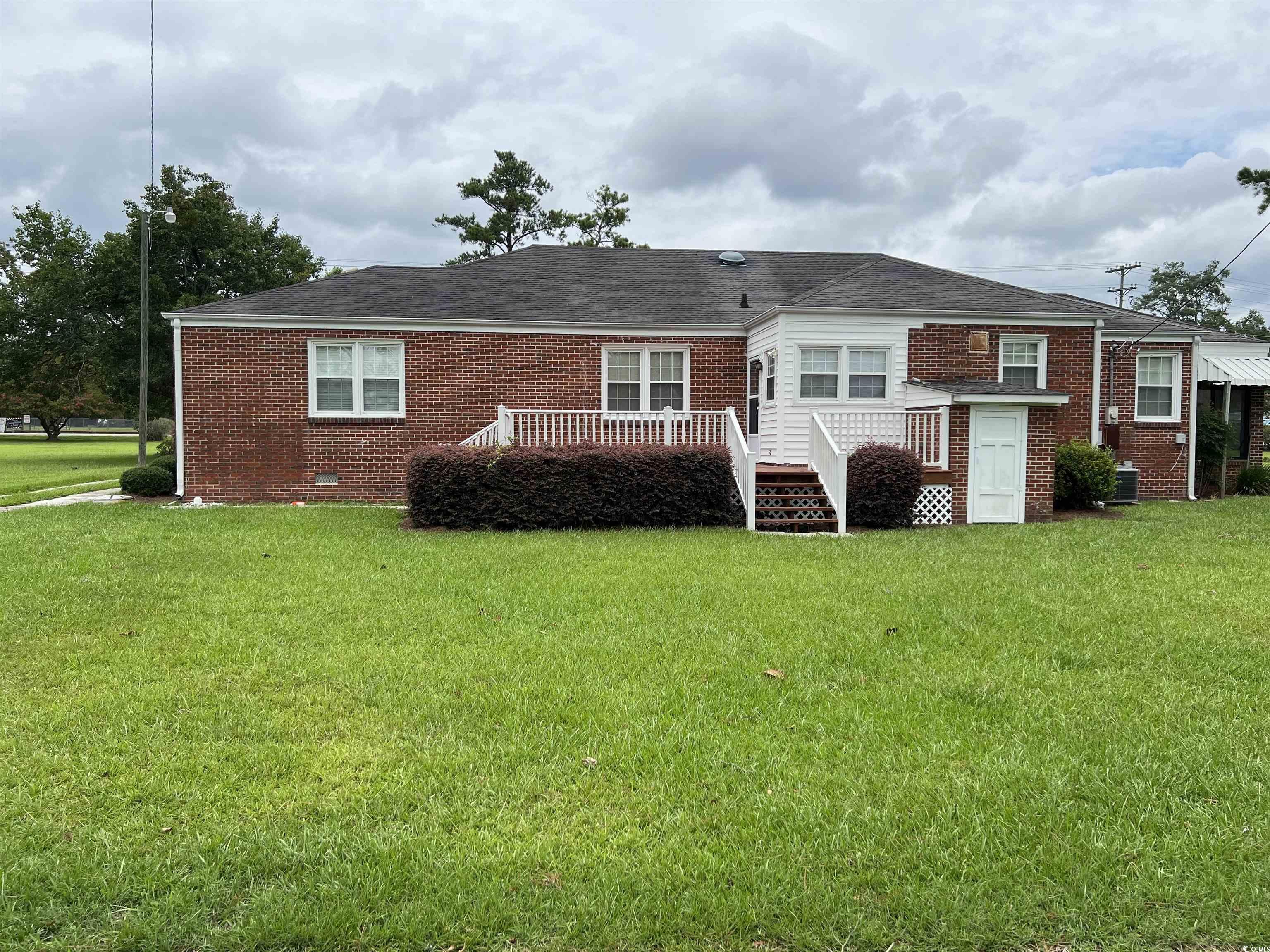 880 Horry Road Conway, SC 29526 - Photo 4 of 16 Back of property with a deck, cooling unit, and a