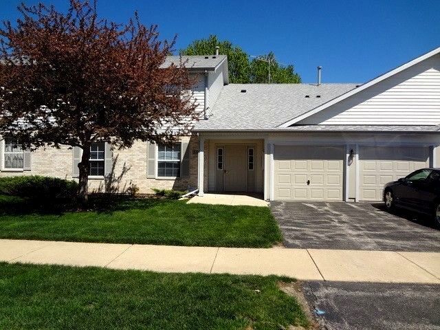 a view of a backyard of the house