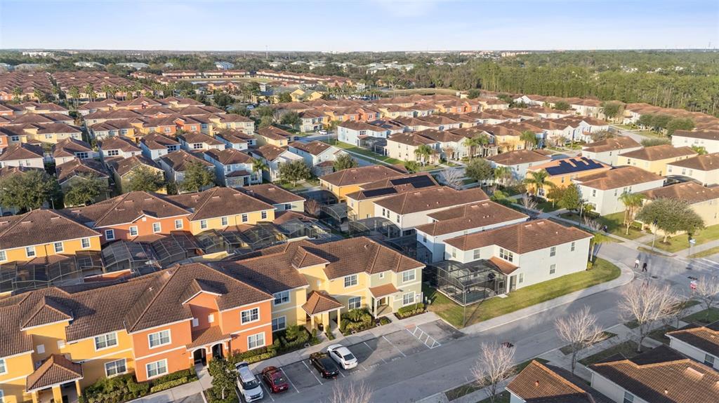 8957 Sugar Palm Road Kissimmee, FL 34747 - Photo 27 of 68 an aerial view of residential houses with outdoor space