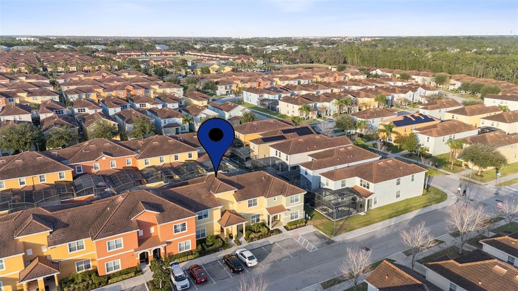 8957 Sugar Palm Road Kissimmee, FL 34747 - Photo 28 of 68 an aerial view of residential houses with outdoor space