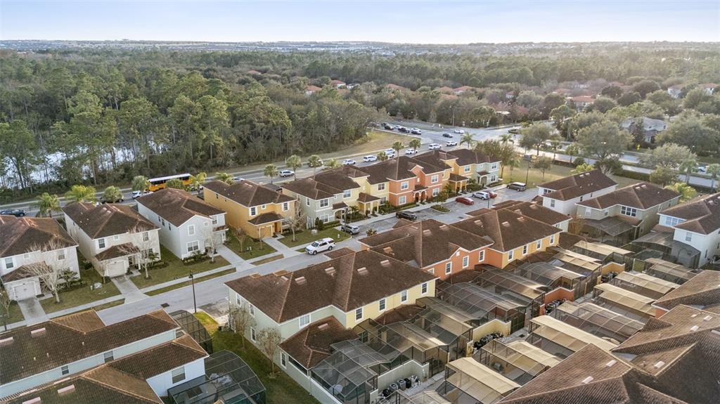 8957 Sugar Palm Road Kissimmee, FL 34747 - Photo 30 of 68 an aerial view of residential houses with outdoor space