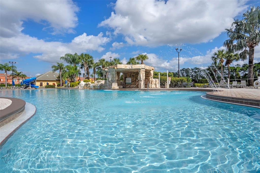 8957 Sugar Palm Road Kissimmee, FL 34747 - Photo 59 of 68 a view of a house with outdoor space and sitting area