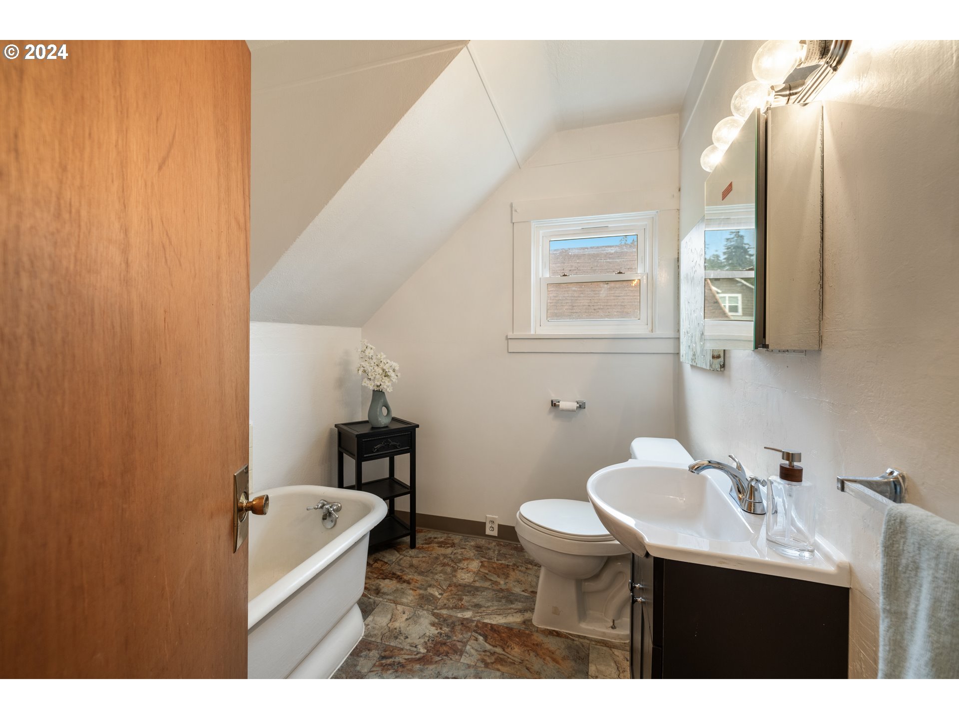 140 Southeast Lamson Street Willamina, OR 97396 - Photo 15 of 46 a bathroom with a sink and a mirror