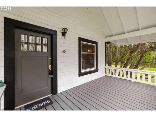 a view of outdoor space with wooden floor