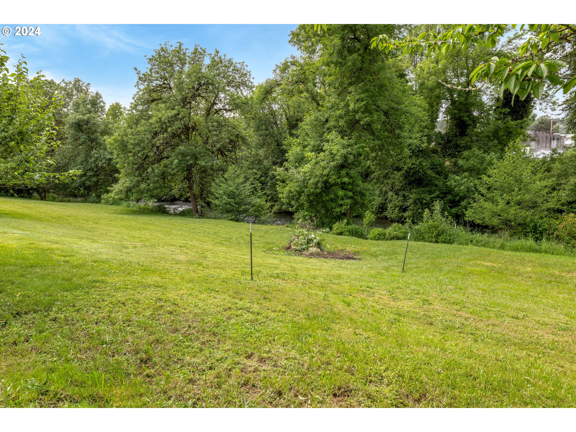 140 Southeast Lamson Street Willamina, OR 97396 - Photo 38 of 46 a view of a field with an outdoor space