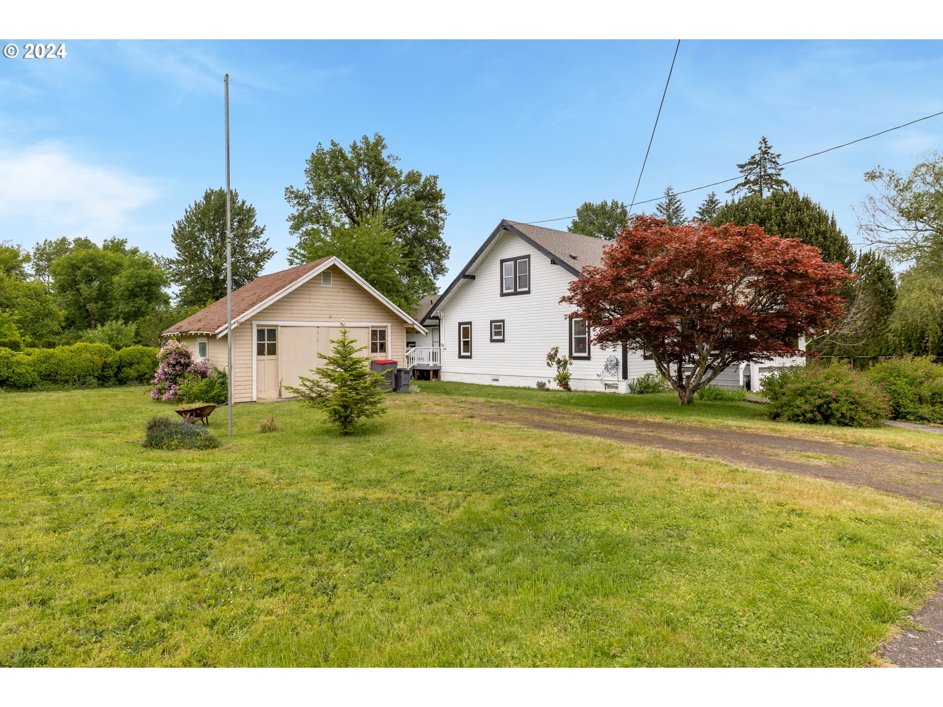 140 Southeast Lamson Street Willamina, OR 97396 - Photo 42 of 46 a view of a house with a yard