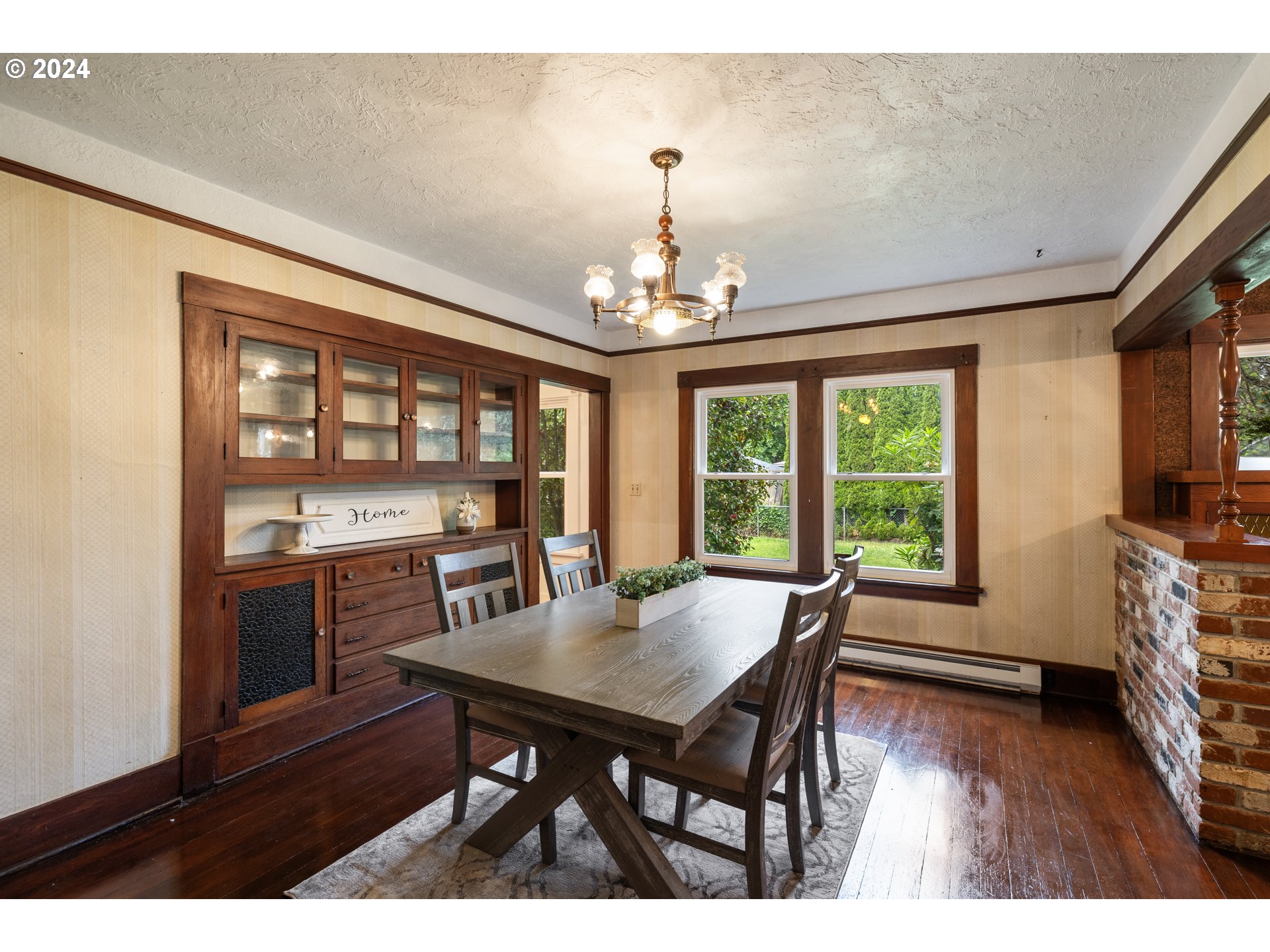 140 Southeast Lamson Street Willamina, OR 97396 - Photo 9 of 46 a view of a dining room with furniture window and wooden floor