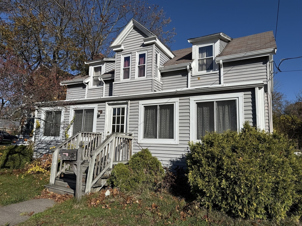 100 Poplar Street Danvers, MA 01923 - Photo 18 of 24 front view of a house with a yard
