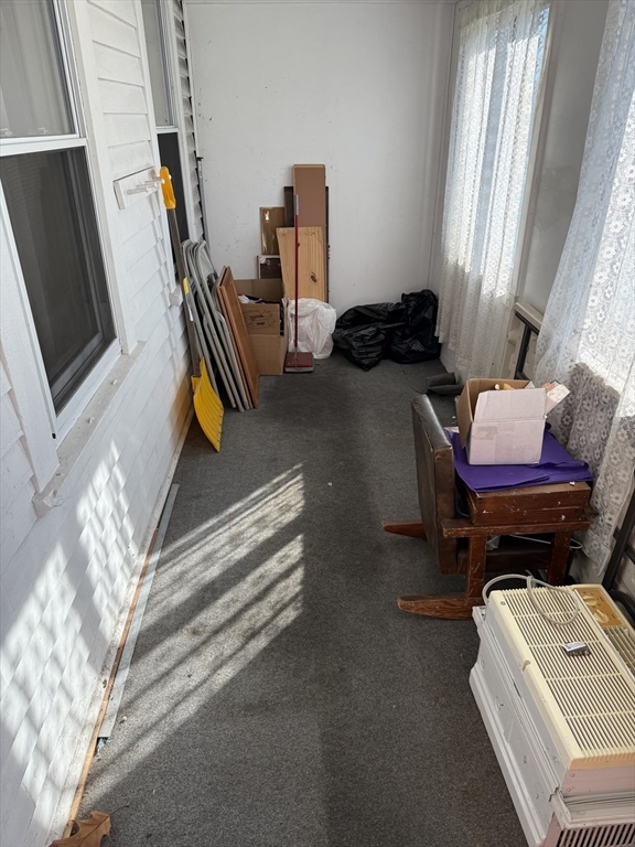 100 Poplar Street Danvers, MA 01923 - Photo 21 of 24 a bedroom with bed and a window