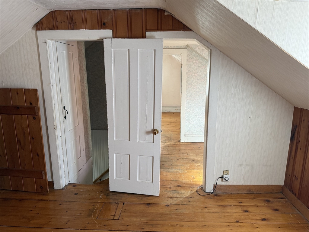 100 Poplar Street Danvers, MA 01923 - Photo 10 of 24 an empty room with wooden floor and windows