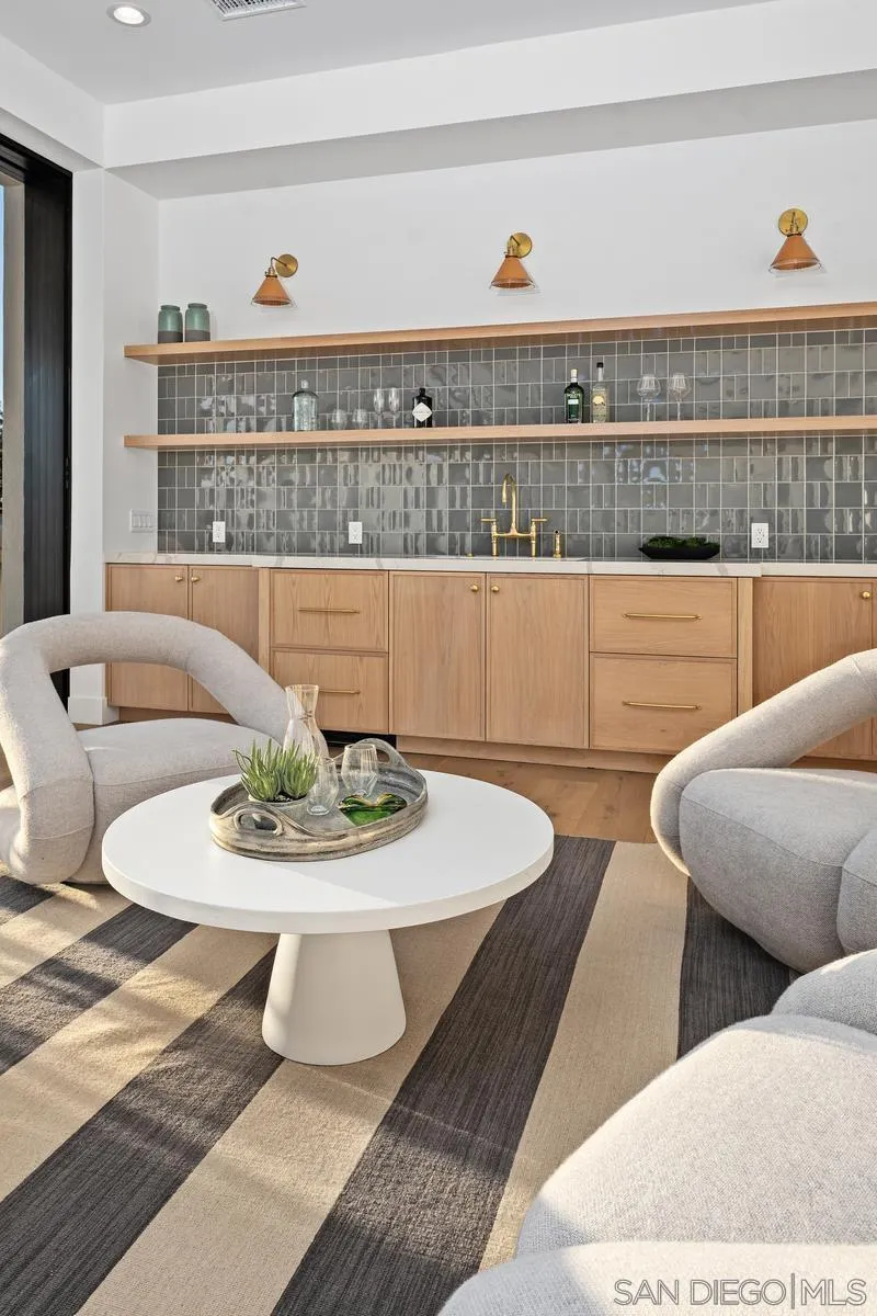 6691-93 Camino Saucito Rancho Santa Fe, CA 92067 - Photo 39 of 55 a living room with furniture