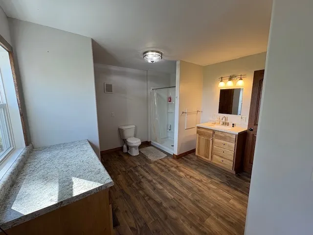 a view of a storage & utility room with a sink
