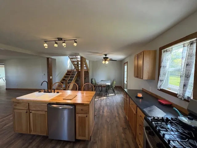 a room with furniture and wooden floor
