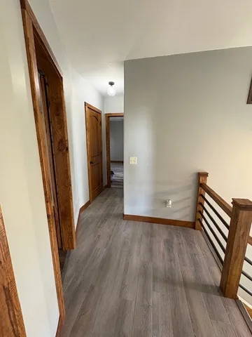 a view of wooden floor in an empty room