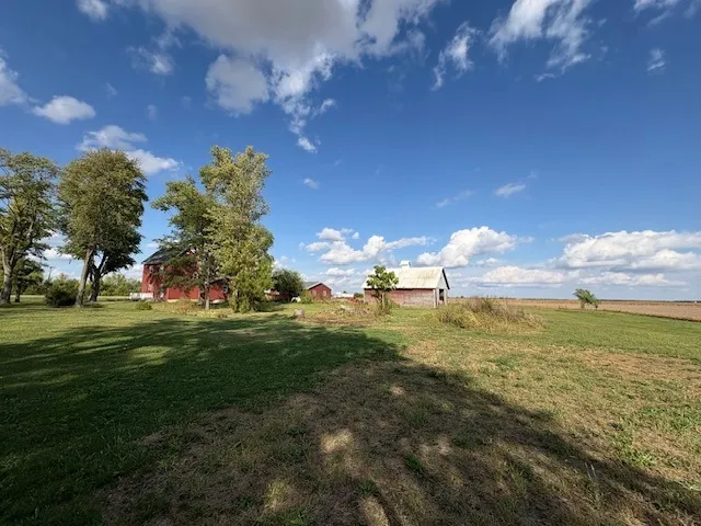 a view of a playground with basketball court