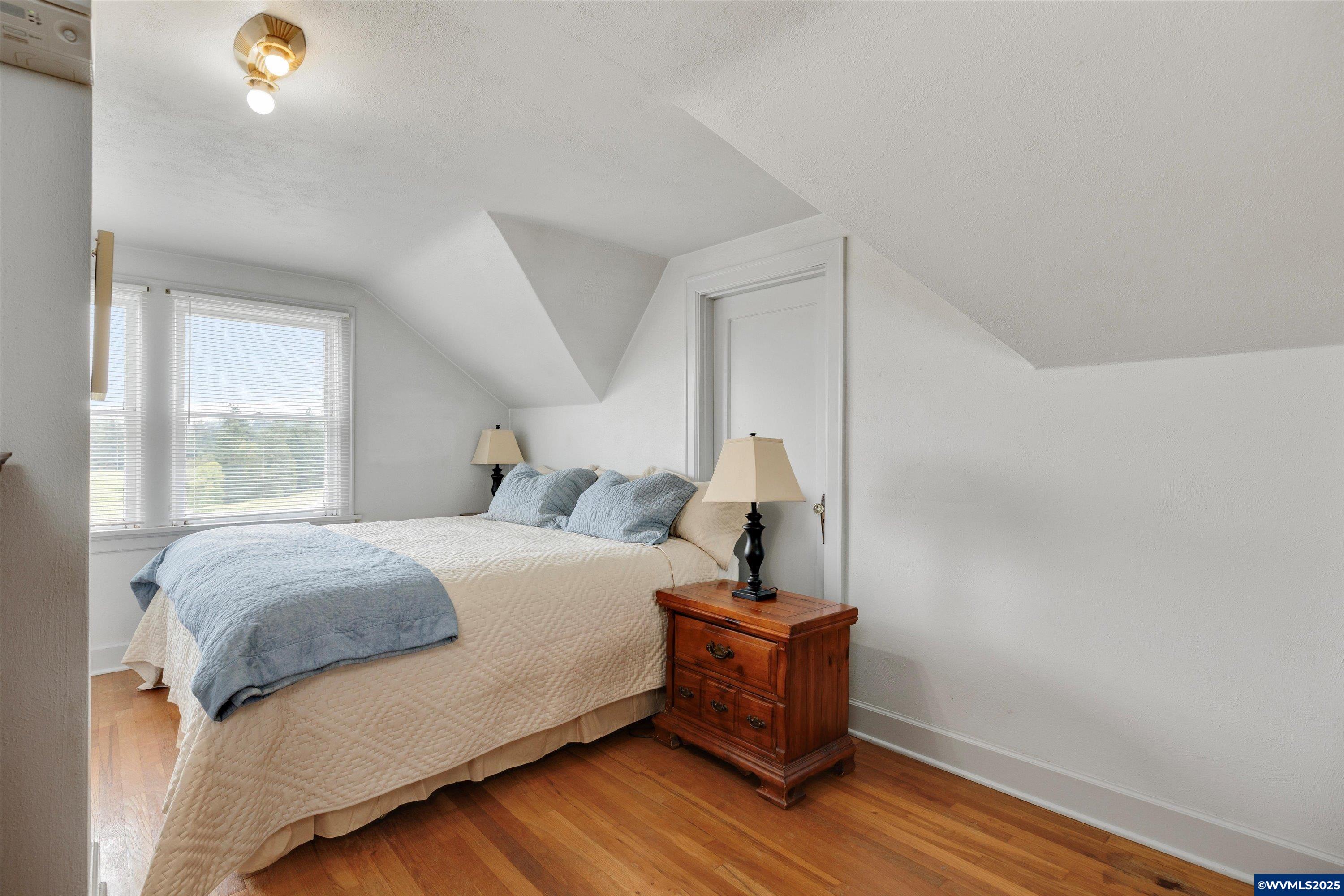 21303 South Central Point Road Canby, OR 97013 - Photo 46 of 50 a bedroom with a bed and a window